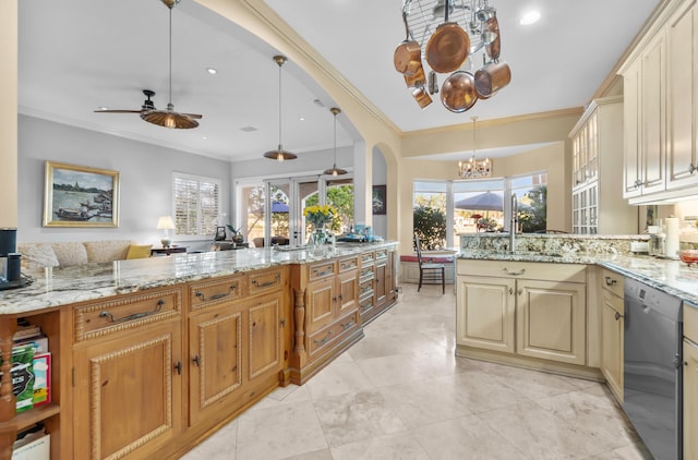 kitchen featuring sink, decorative light fixtures, stainless steel dishwasher, and kitchen peninsula