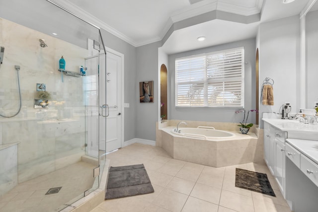 bathroom featuring ornamental molding, independent shower and bath, tile patterned flooring, and vanity