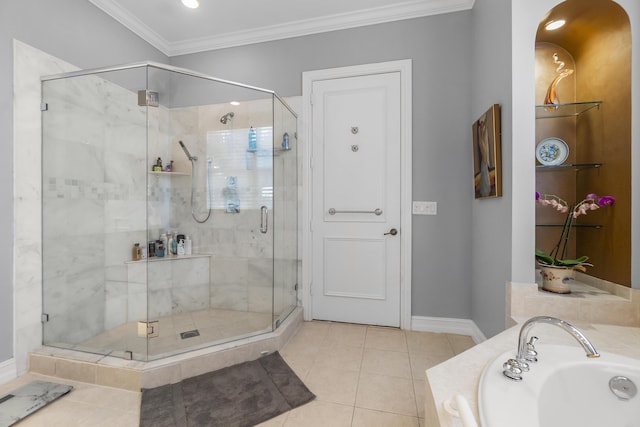 bathroom featuring tile patterned floors, ornamental molding, plus walk in shower, and sink