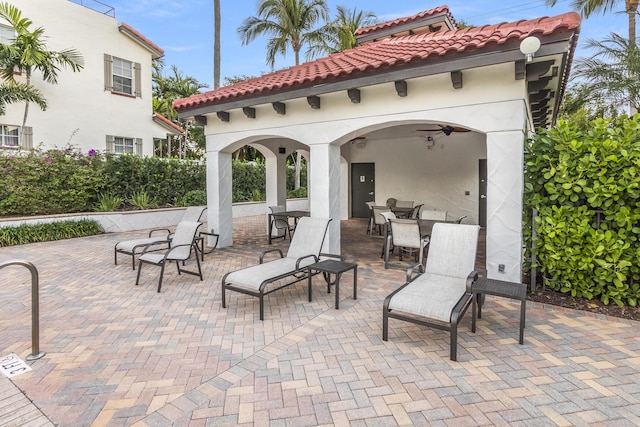 view of patio with ceiling fan