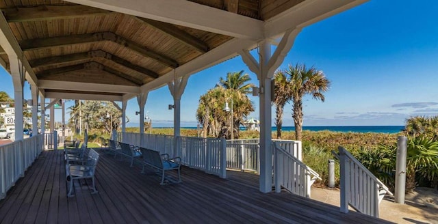 wooden terrace with a water view