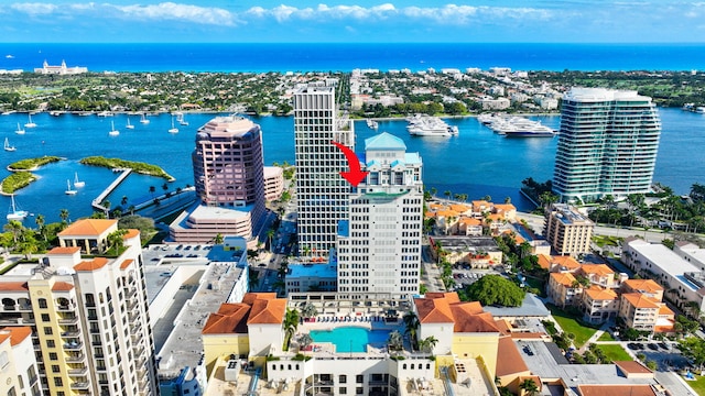 birds eye view of property featuring a water view