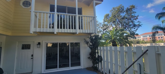 view of home's exterior featuring a balcony