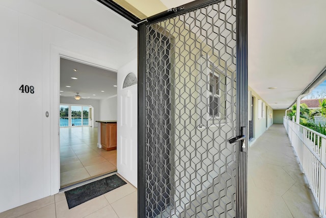 hall with light tile patterned floors and recessed lighting