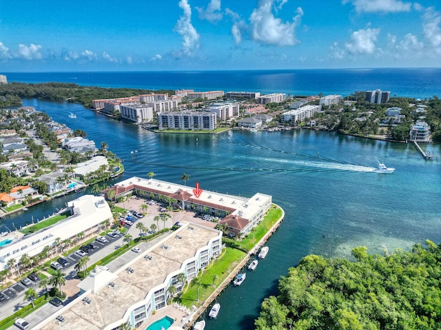 drone / aerial view with a water view