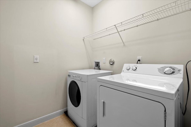 laundry room featuring washing machine and dryer