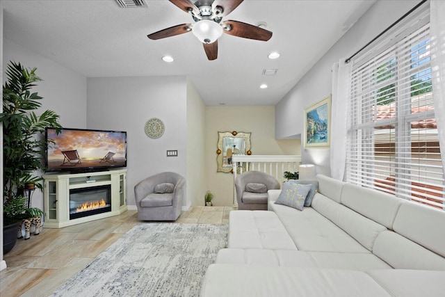 living room with ceiling fan