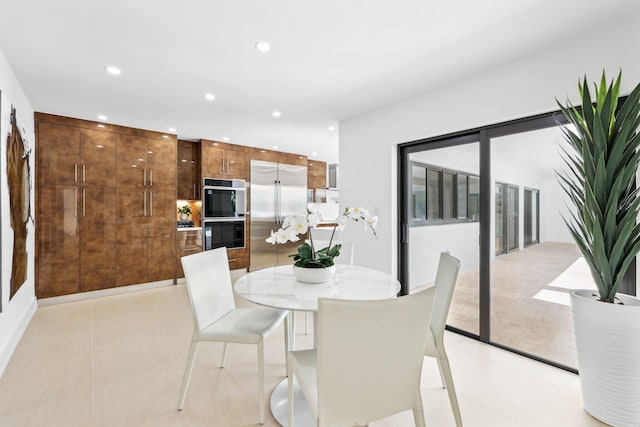 dining space with light tile patterned floors