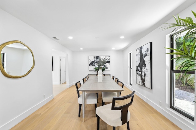 dining space featuring light hardwood / wood-style flooring