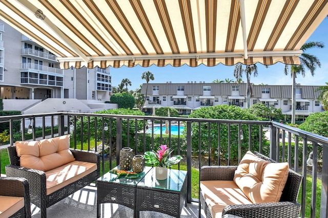 balcony with an outdoor hangout area