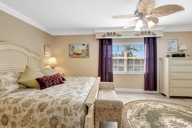 bedroom with ornamental molding and ceiling fan