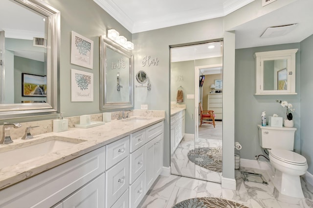 bathroom with ornamental molding, toilet, and vanity