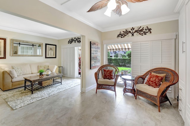 sitting room with ornamental molding and ceiling fan