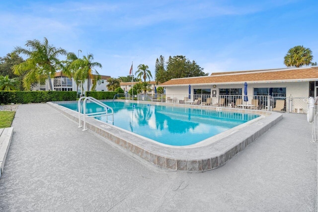 view of pool featuring a patio