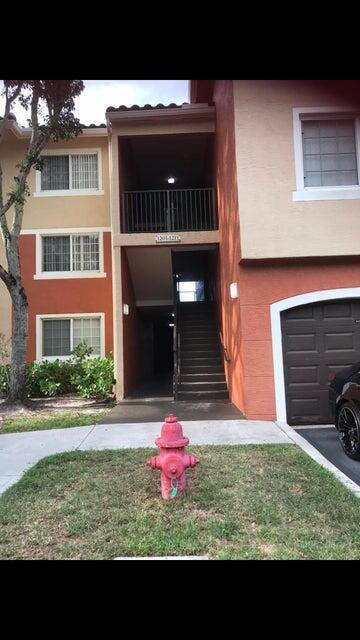 view of property with a garage