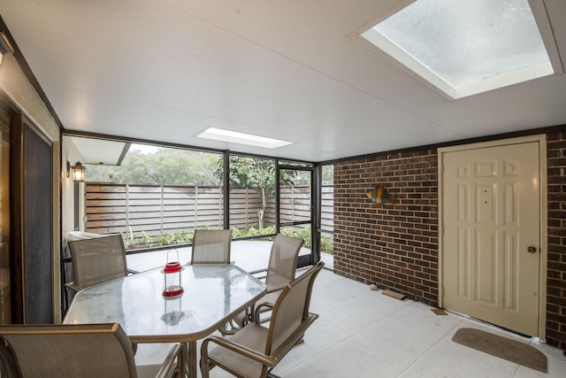 sunroom with a skylight