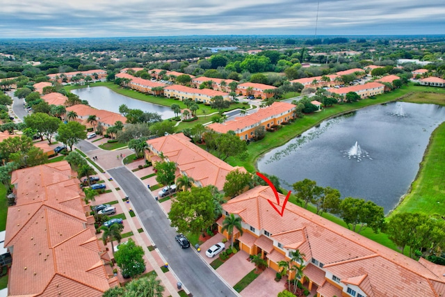 drone / aerial view with a water view