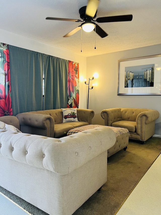 living room featuring carpet and ceiling fan