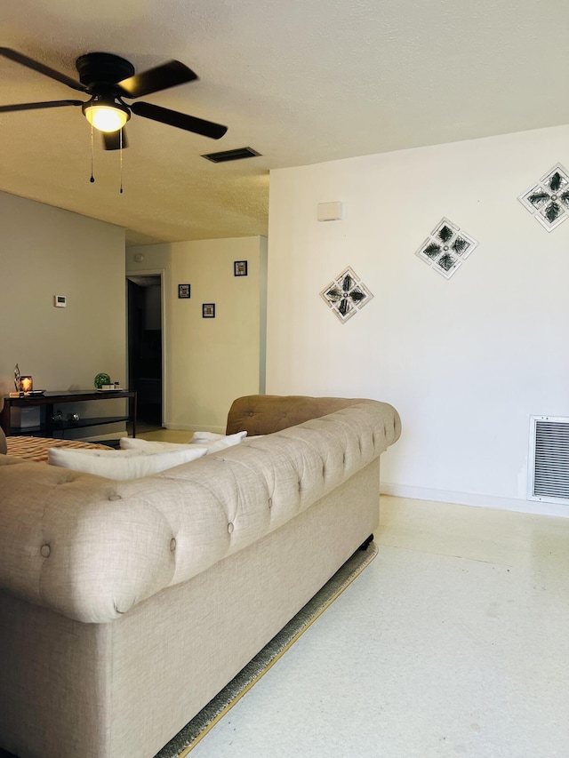 living room with ceiling fan