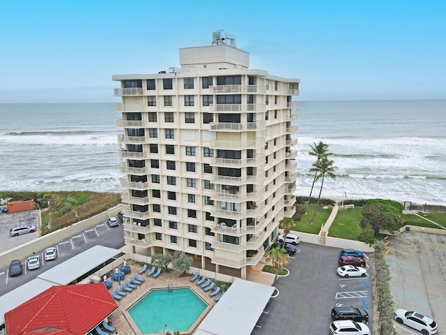 view of building exterior featuring a water view