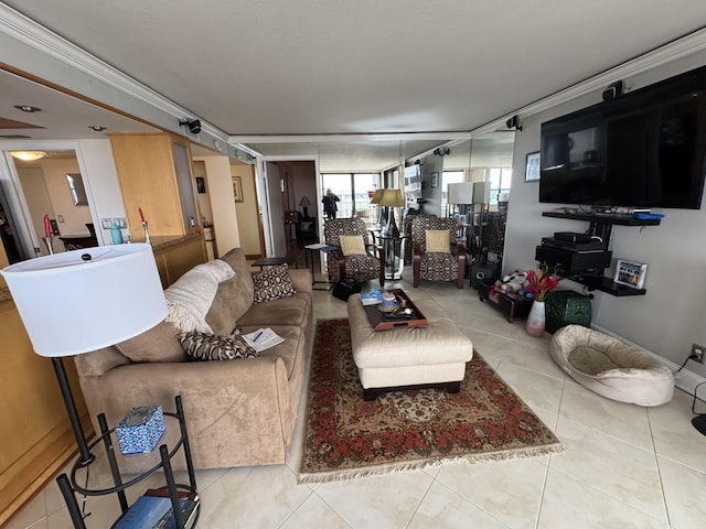 tiled dining area featuring ceiling fan, a wall of windows, ornamental molding, and sink