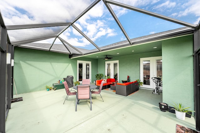 view of patio / terrace featuring an outdoor living space, french doors, and ceiling fan