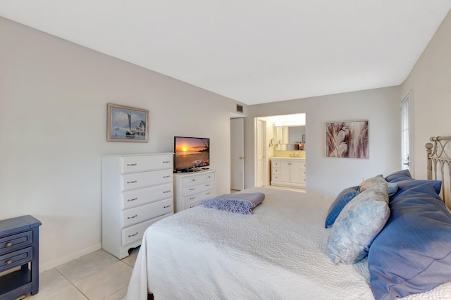 tiled bedroom with ensuite bathroom