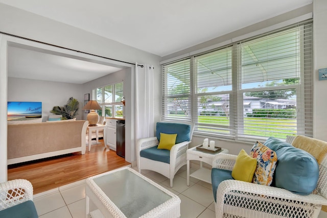 sitting room with light tile patterned floors