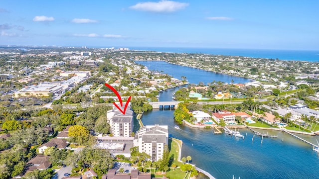 birds eye view of property featuring a water view