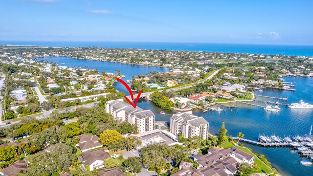 birds eye view of property featuring a water view