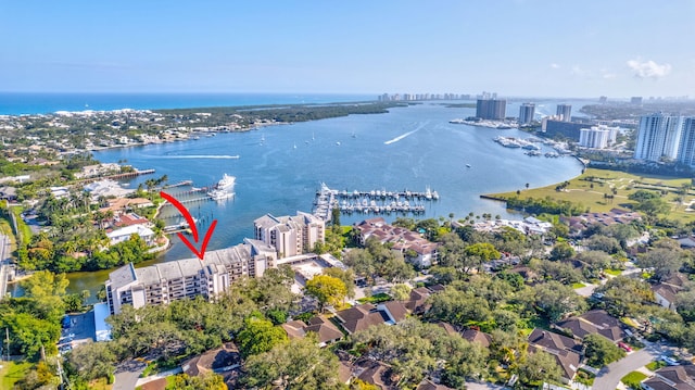 birds eye view of property featuring a water view