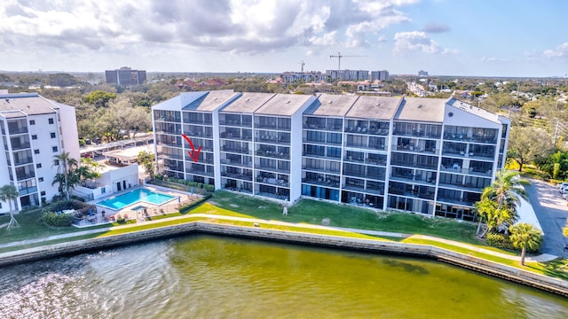 birds eye view of property with a water view