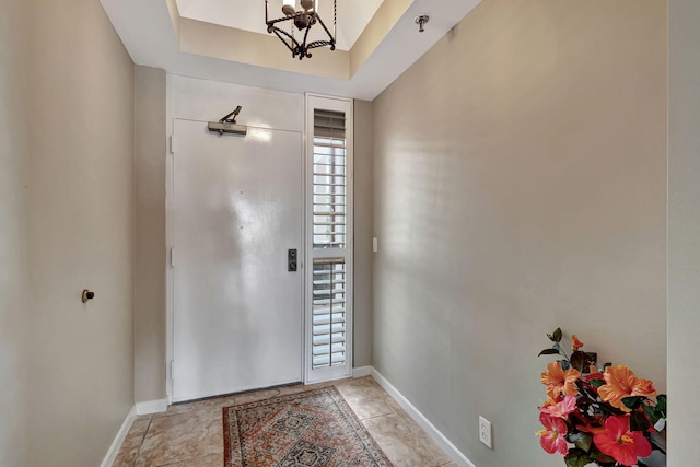 entrance foyer with a chandelier