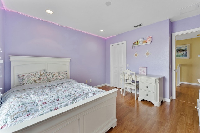 bedroom featuring light hardwood / wood-style flooring