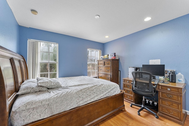 bedroom featuring light wood-type flooring