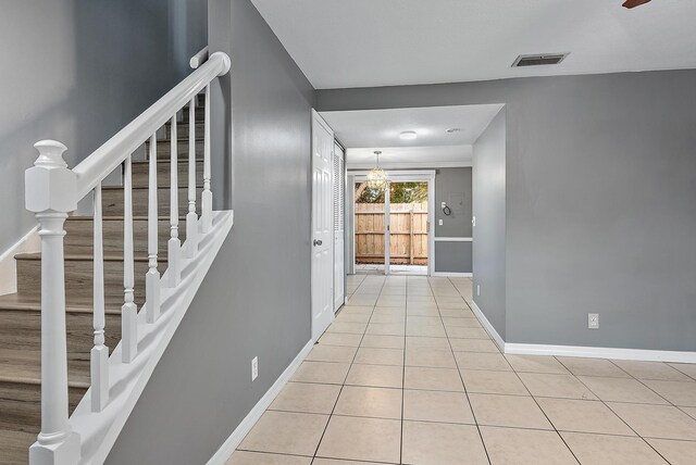 interior space featuring light tile patterned floors