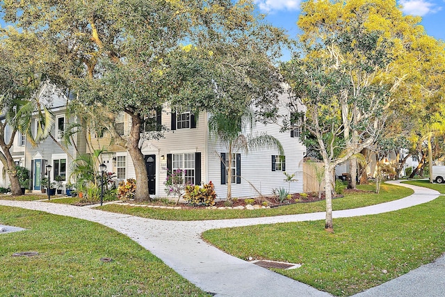 view of front of house with a front lawn