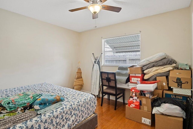 bedroom featuring ceiling fan and light hardwood / wood-style floors