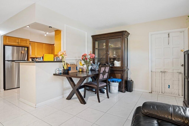 dining room with light tile patterned floors