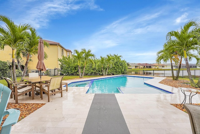 view of swimming pool featuring a patio area