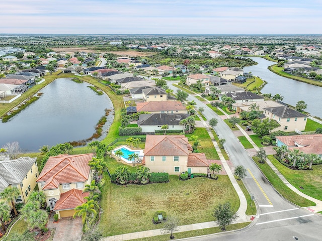 bird's eye view with a water view