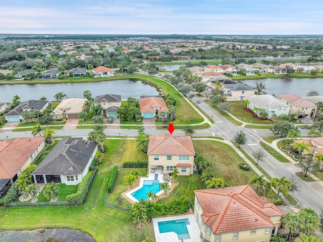 bird's eye view with a water view