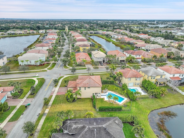 drone / aerial view with a water view