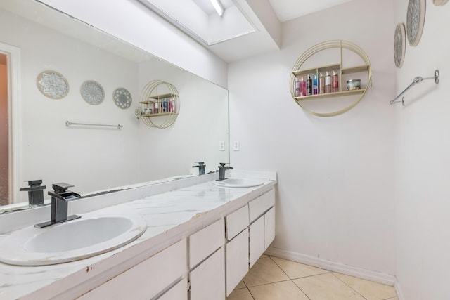 bathroom with vanity and tile patterned floors