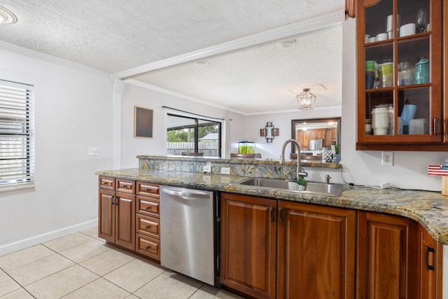 kitchen with sink, light stone counters, crown molding, light tile patterned floors, and dishwasher