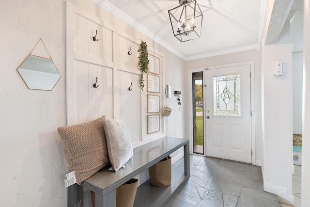 mudroom with an inviting chandelier and ornamental molding