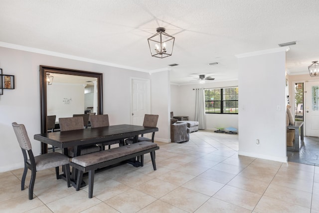 dining area featuring crown molding, a healthy amount of sunlight, light tile patterned flooring, and a textured ceiling