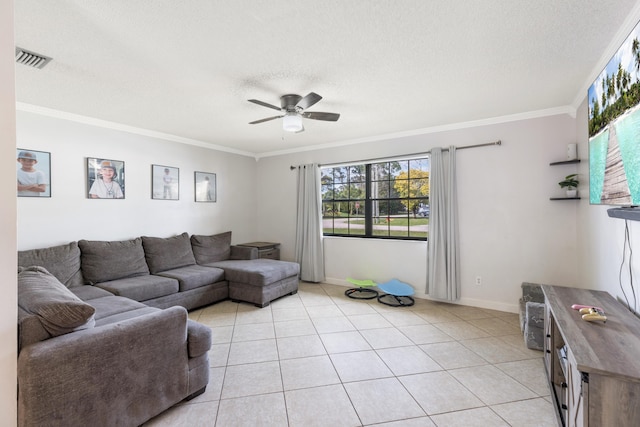 living area with baseboards, ornamental molding, a textured ceiling, light tile patterned flooring, and ceiling fan