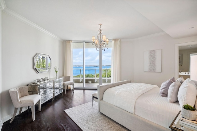 bedroom with a water view, access to exterior, ornamental molding, expansive windows, and dark wood finished floors