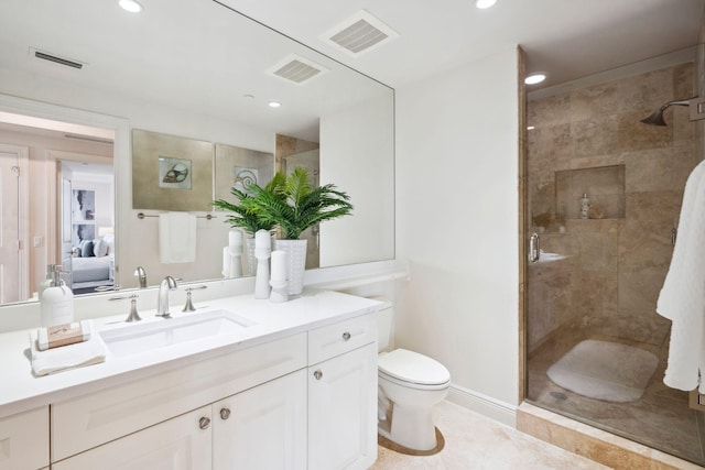 full bath featuring visible vents, connected bathroom, vanity, and toilet